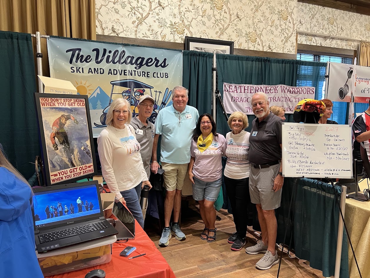 Villagers Ski Club volunteers running the booth